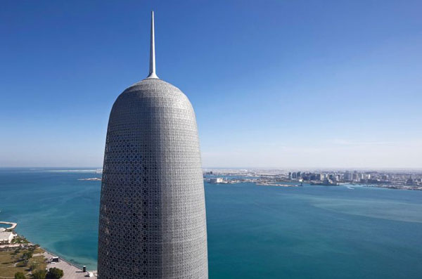 Jean Nouvel, Doha, Qatar, Burj Doha, tower, skyscraper, high-rise, architectural statement, iconic design, landmark, Doha waterfront, lace-like skin, shanasheel screen, dia-grid reinforced concrete